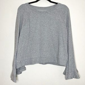 Grey cropped sweatshirt with trumpet sleeves